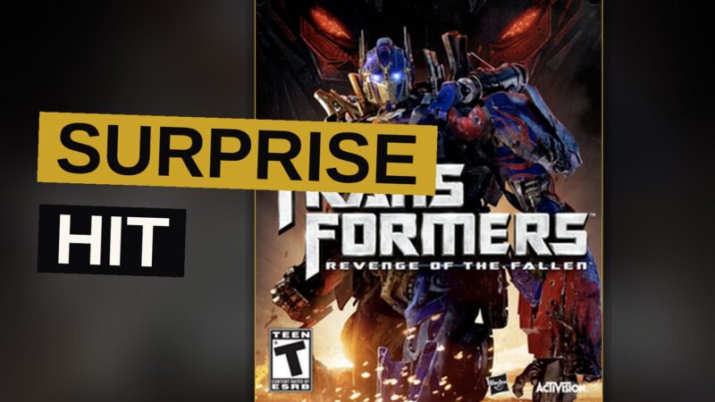 Optimus Prime and Megatron clash in a desert battlefield with explosions.
