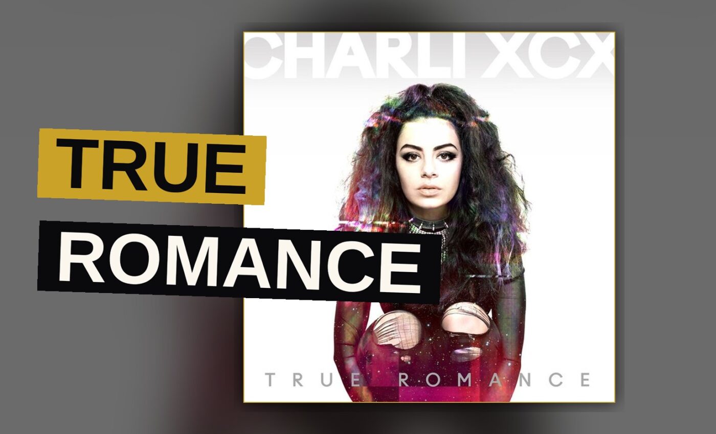 A pop singer performs under colored stage lights evoking a retro 90s girl group aesthetic.