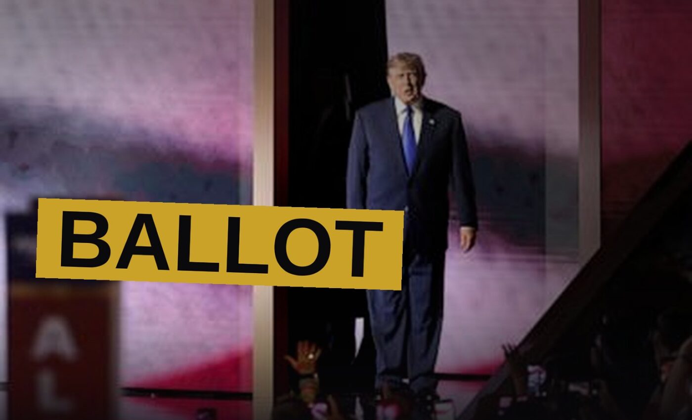 Donald Trump speaks at a podium before a large crowd at a GOP convention in a Dallas arena.