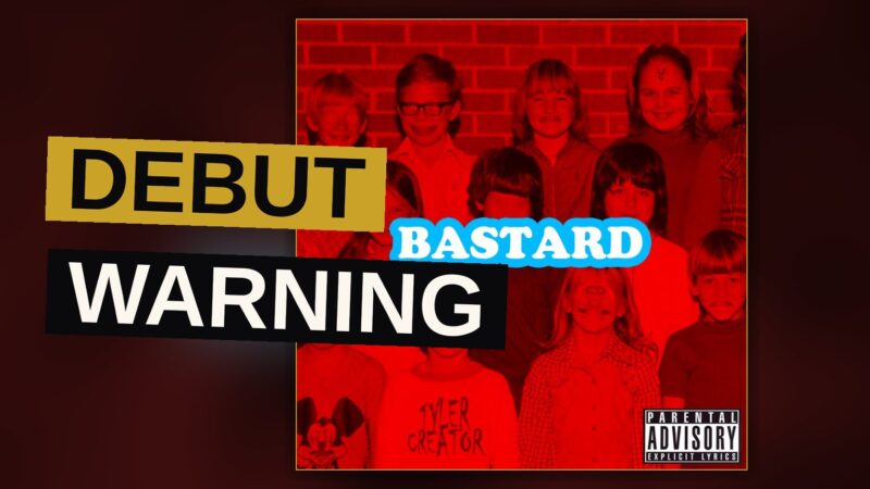 A rapper stands in red light amid shadowy figures, conveying raw confrontation.
