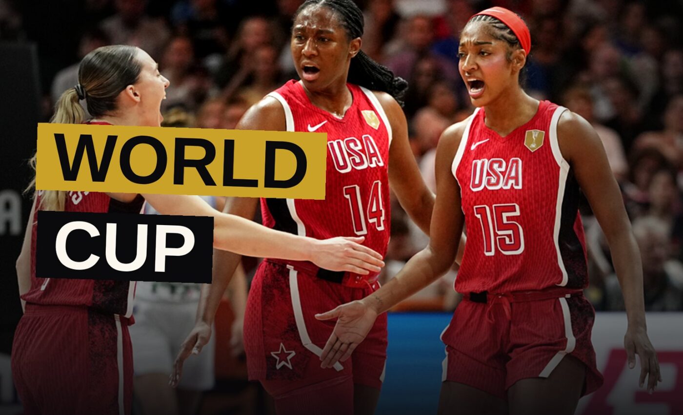 A Team USA basketball player drives past a Hungary defender during a fast-paced game in a packed arena.