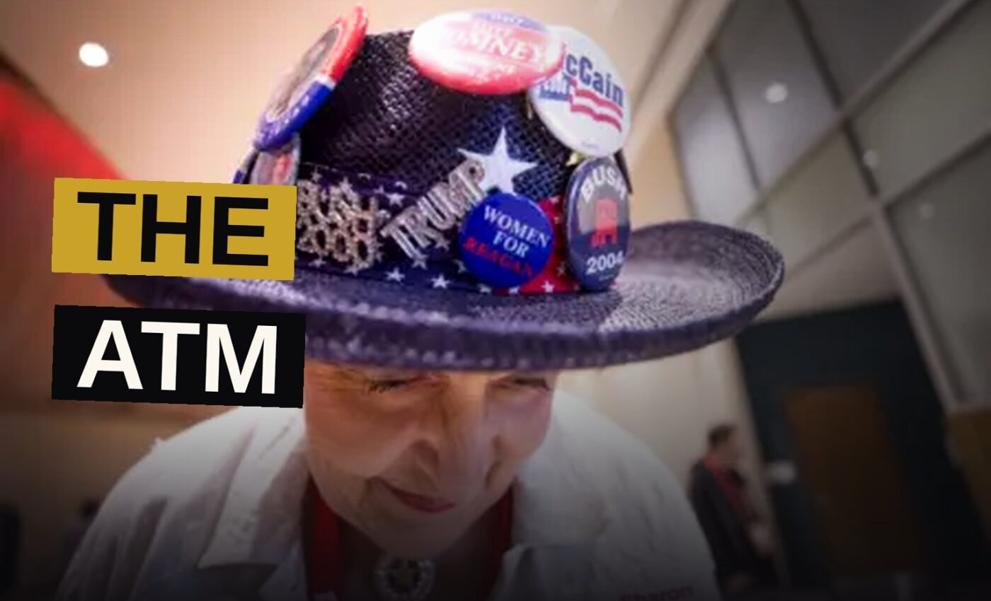 A crowded Texas arena filled with Republican convention attendees under stage lighting.
