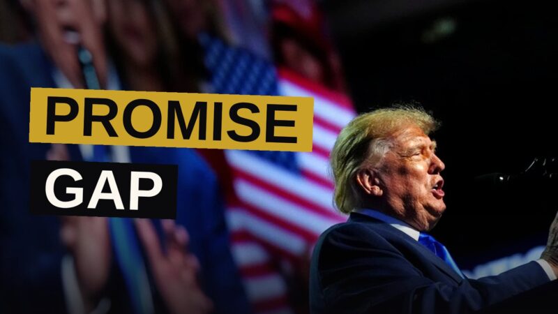 A hand holds a torn and faded $5,000 check against a blurred American flag background, suggesting a broken promise.