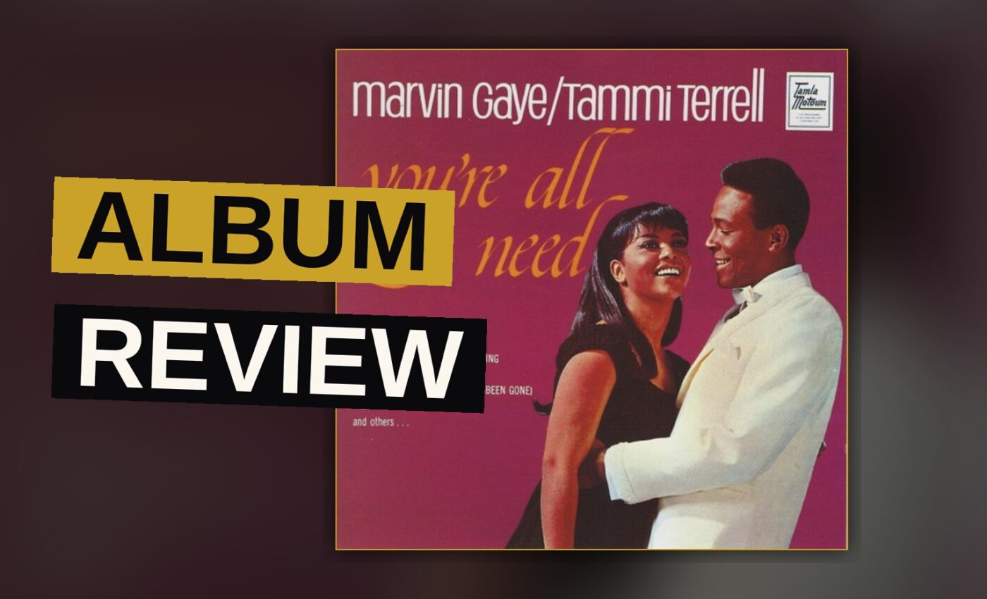 Marvin Gaye and Tammi Terrell smiling together in a warm, vintage studio portrait.